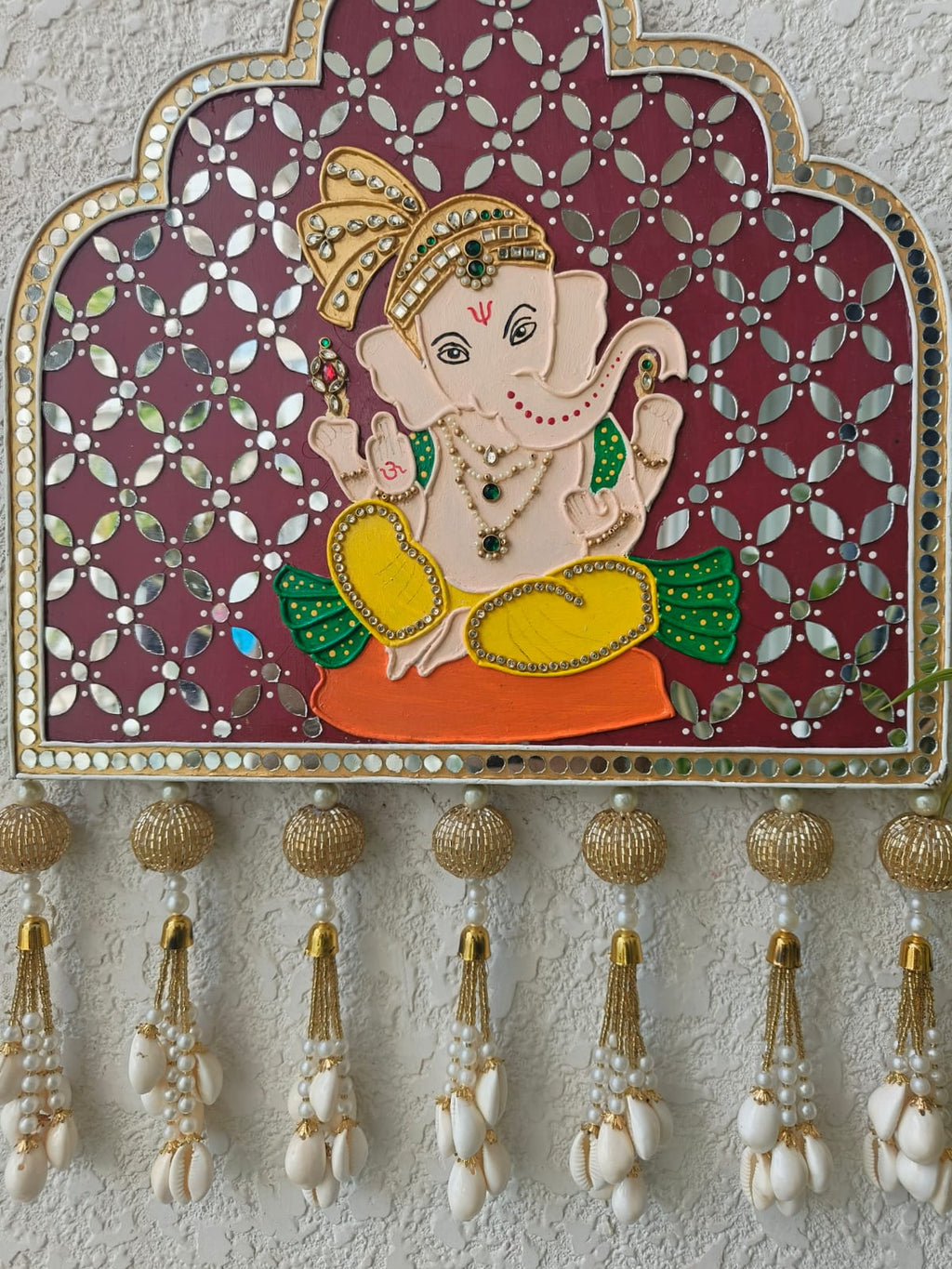 Handcrafted Ganesha Mirror Work Wall Hanging with Shell Tassels