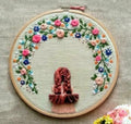 Girl looking out of the window Embroidered Hoop