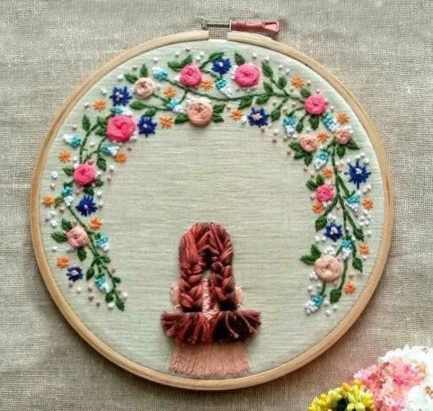 Girl looking out of the window Embroidered Hoop